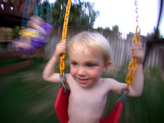 Marcus on his new swing, A Day In the Life of John photo