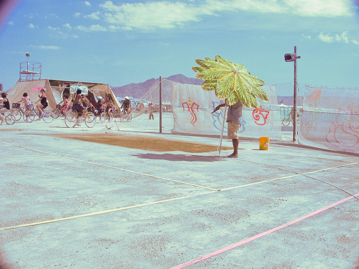 Geoffrey Watering the Court, Burning Man photo