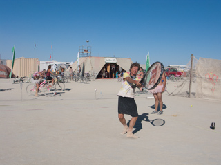 Tom with the Giant Racquet, Burning Man photo